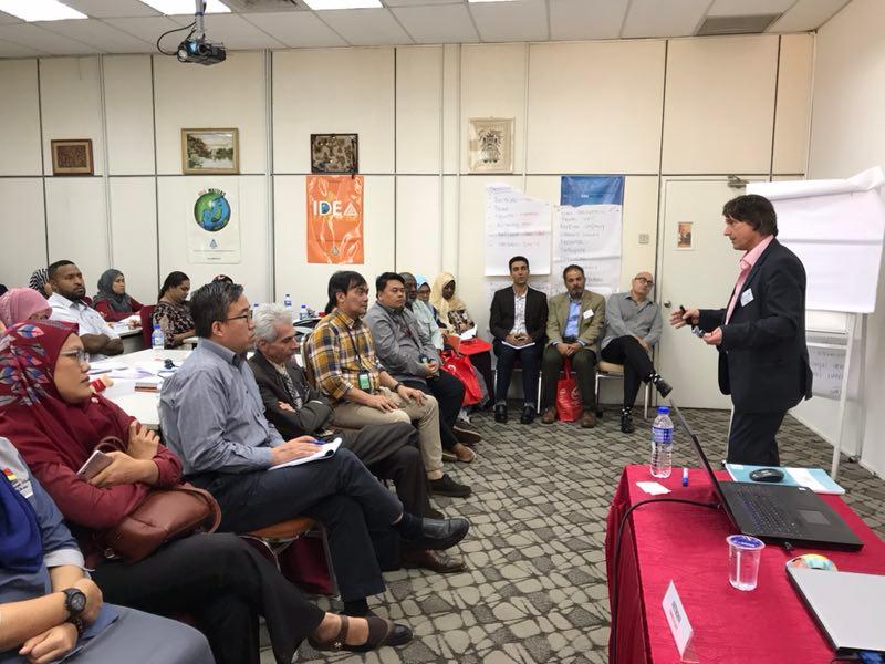 Dr. Les speaking